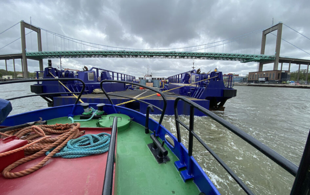 barge towing inland waterways tug Sweden Sandinge